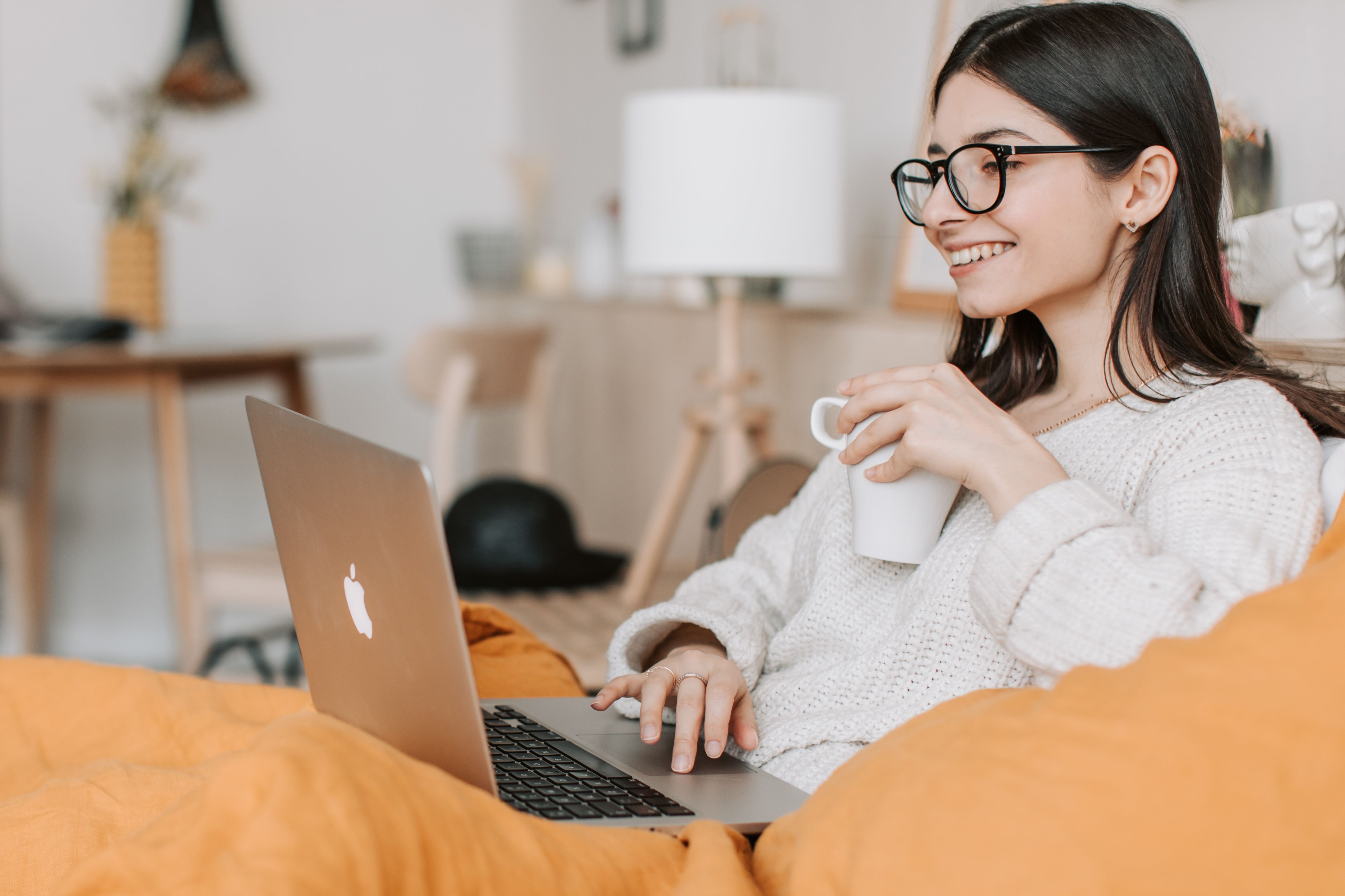 Best teas clear skin healthy hair: chamomile, green tea, and rooibos A flat lay of dried chamomile, green tea leaves, and rooibos on a white ceramic dish - best teas clear skin healthy hair